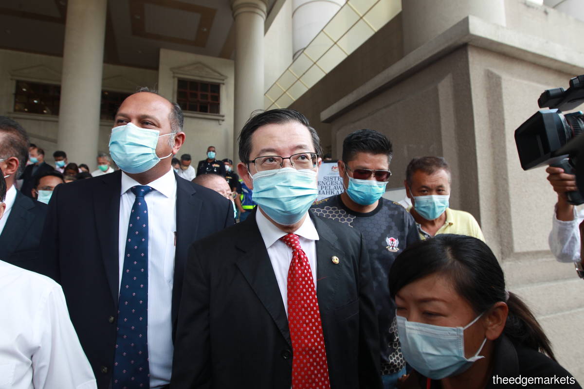 Guan Eng claims trial to two charges of misappropriation of property